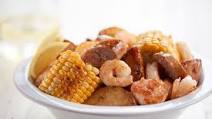 Southern Shrimp and Sausage Roast with potatoes, corn, and garlic butter Southern Shrimp and Sausage Roast with potatoes, corn, and garlic butter