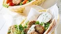 Falafel in pita bread with tzatziki Falafel in pita bread with tzatziki