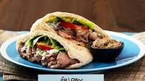 Pita Bread Stuffed with Beef Steak and Hummus Pita Bread Stuffed with Beef Steak and Hummus