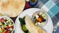 Falafel Pita Wrap with Greek Salad Falafel Pita Wrap with Greek Salad