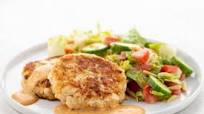 Fish Cake Caesar Salad with remoulade and almonds Fish Cake Caesar Salad with remoulade and almonds