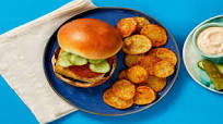 Cheesy Pub Burgers with Griddled Onion, Chipotle Sauce, & Potato Rounds Cheesy Pub Burgers with Griddled Onion, Chipotle Sauce, & Potato Rounds