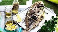 Whole barbecued fish with lemon Whole barbecued fish with lemon