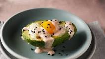 Air Fried Avocado Egg Cups with Sriracha Yogurt Cream Air Fried Avocado Egg Cups with Sriracha Yogurt Cream