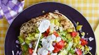 Chicken Souvlaki & Tzatziki Sauce on Garlic Naan Chicken Souvlaki & Tzatziki Sauce on Garlic Naan