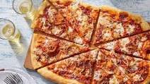 Three-Cheese Pizza with Caramelized Onion Three-Cheese Pizza with Caramelized Onion