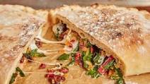 Calzone di verdura – Swiss chard, mozzarella, pine nut and raisin calzone Calzone di verdura – Swiss chard, mozzarella, pine nut and raisin calzone