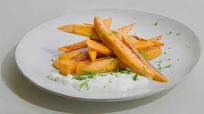 Tepan-cooked sweet potato chips with tzatziki dip Tepan-cooked sweet potato chips with tzatziki dip