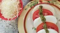 Caprese Salad with Pesto Drizzle Caprese Salad with Pesto Drizzle