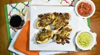 8 & $20 Recipe: Steak-Loaded Cheesy Baked Potatoes | Wine Spectator 8 & $20 Recipe: Steak-Loaded Cheesy Baked Potatoes | Wine Spectator