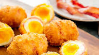 Deep Fried Bacon Wrapped Eggs Deep Fried Bacon Wrapped Eggs
