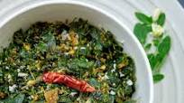 Moringa Leaves Stir-Fry (Thoran) with Grate Coconut Moringa Leaves Stir-Fry (Thoran) with Grate Coconut