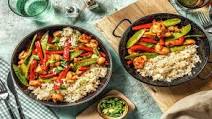 Chinese Salt & Pepper Chicken With Stir-fried Veggies on Garlic Rice Chinese Salt & Pepper Chicken With Stir-fried Veggies on Garlic Rice