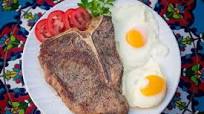 Breakfast T-Bone Steak with Fried Eggs Breakfast T-Bone Steak with Fried Eggs