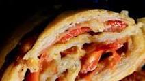 How to make stromboli with red peppers and pancetta How to make stromboli with red peppers and pancetta