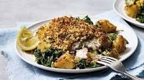 Coconut-crusted fish with saag aloo Coconut-crusted fish with saag aloo