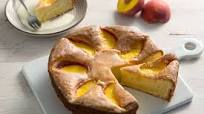 Olive oil cake with peaches and a lemon glaze Olive oil cake with peaches and a lemon glaze