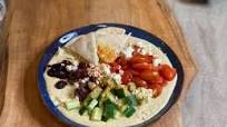 Loaded Hummus Bowl with Feta, Tomatoes and Cucumbers Loaded Hummus Bowl with Feta, Tomatoes and Cucumbers