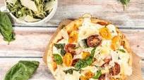 Neapolitan Pizza Margherita with arugula salad Neapolitan Pizza Margherita with arugula salad