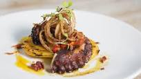 Octopus Tentacle with Caramelized Onions Octopus Tentacle with Caramelized Onions