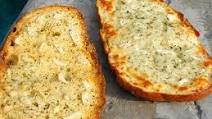 Buca di Beppo Garlic Bread and Garlic Bread with Mozzarella Buca di Beppo Garlic Bread and Garlic Bread with Mozzarella