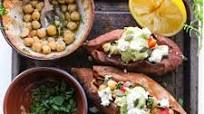 Mediterranean Stuffed Sweet Potatoes with Chickpeas & Avocado Tahini Mediterranean Stuffed Sweet Potatoes with Chickpeas & Avocado Tahini