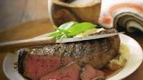 New York State au poivre with shallot cognac sauce New York State au poivre with shallot cognac sauce