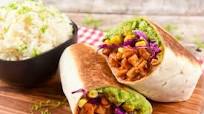 Spicy Sofritas Burrito with tofu, avocado, and corn Spicy Sofritas Burrito with tofu, avocado, and corn