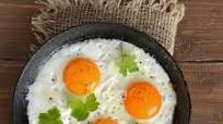Frying eggs in the cast iron skillet Frying eggs in the cast iron skillet
