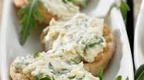 Bruschetta de pollo y rúcula Bruschetta de pollo y rúcula