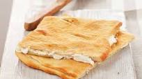 Focaccia di Recco con stracchino Focaccia di Recco con stracchino