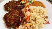 Afghani kabuli pulao (rice pilaf) and chapli kabab Afghani kabuli pulao (rice pilaf) and chapli kabab