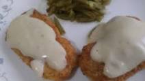 Cajun parmesan crusted Pork cutlets with white gravy Cajun parmesan crusted Pork cutlets with white gravy