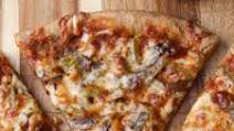 Thin Crust Guinness Pizza with Shredded Beef, Mushrooms and Peppers Thin Crust Guinness Pizza with Shredded Beef, Mushrooms and Peppers
