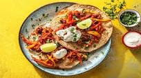 Tostadas Rapidas Vegetarianas with Soured Cream and Coriander Tostadas Rapidas Vegetarianas with Soured Cream and Coriander