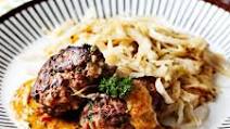 Keto hamburger patties with creamy tomato sauce and fried cabbage Keto hamburger patties with creamy tomato sauce and fried cabbage