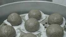 Black sesame steamed bun with coffee lotus paste Black sesame steamed bun with coffee lotus paste