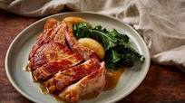 Pork chop in a cider cream sauce with caramelised apples and purple sprouting broccoli Pork chop in a cider cream sauce with caramelised apples and purple sprouting broccoli