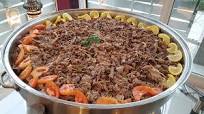 Add Lamb Ouzi to Your Spread to Guarantee a Crowd-Pleaser Add Lamb Ouzi to Your Spread to Guarantee a Crowd-Pleaser