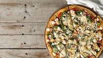 Spanish-Style Pizza with Romesco Sauce, Spinach, and Artichoke Hearts Spanish-Style Pizza with Romesco Sauce, Spinach, and Artichoke Hearts