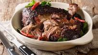Pernil: the delicious Puerto Rican recipe for slow-cooked pork shoulder Pernil: the delicious Puerto Rican recipe for slow-cooked pork shoulder