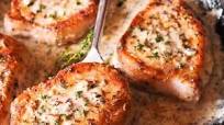 Boneless Pork Chops in Creamy Garlic and Herb Wine Sauce Boneless Pork Chops in Creamy Garlic and Herb Wine Sauce