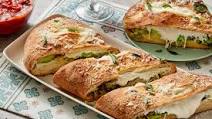 Three-Cheese & Broccoli Stromboli with Tomato & Oregano Dipping Sauce Three-Cheese & Broccoli Stromboli with Tomato & Oregano Dipping Sauce