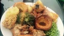 Roast pork and crackling with cider and shallot gravy, and apple sauce Roast pork and crackling with cider and shallot gravy, and apple sauce