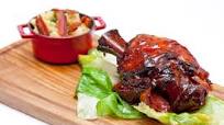 Ham hock cooked in pilsner with honey and ginger Ham hock cooked in pilsner with honey and ginger