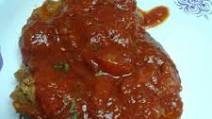 Stewed pork chops in a marinara sauce Stewed pork chops in a marinara sauce