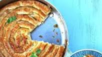 Greek Snail Shaped Cheese Pie Recipe With Feta, Yogurt And Béchamel Cream Filling Greek Snail Shaped Cheese Pie Recipe With Feta, Yogurt And Béchamel Cream Filling