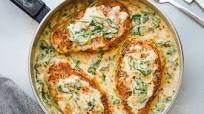 Boneless Pork Chops in Creamy Garlic Spinach Sauce Boneless Pork Chops in Creamy Garlic Spinach Sauce
