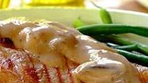 Pork Chops with a Creamy Wine and Mushroom Sauce Pork Chops with a Creamy Wine and Mushroom Sauce