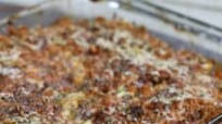 italian summer casserole: baked zucchini, brown rice and tomato sauce with sausage italian summer casserole: baked zucchini, brown rice and tomato sauce with sausage